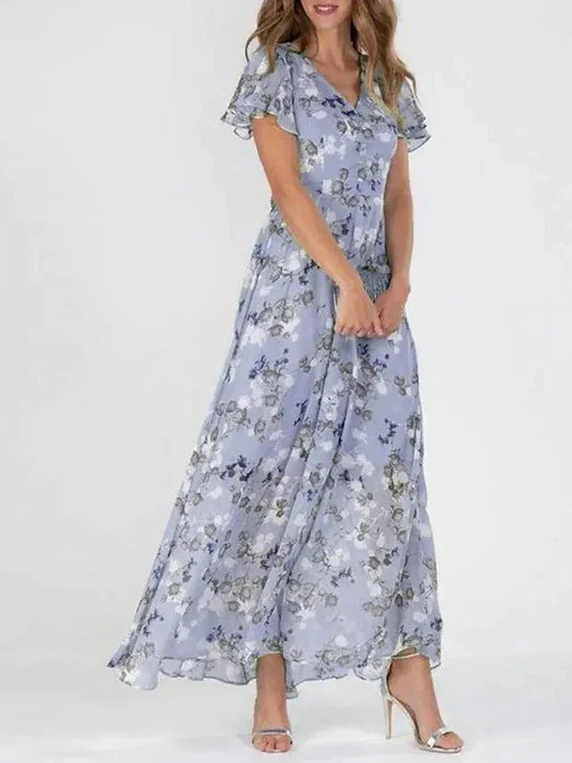 Junmie – Elegante maxi-jurk van chiffon met bloemen