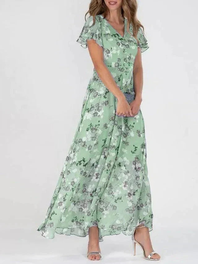 Junmie – Elegante maxi-jurk van chiffon met bloemen