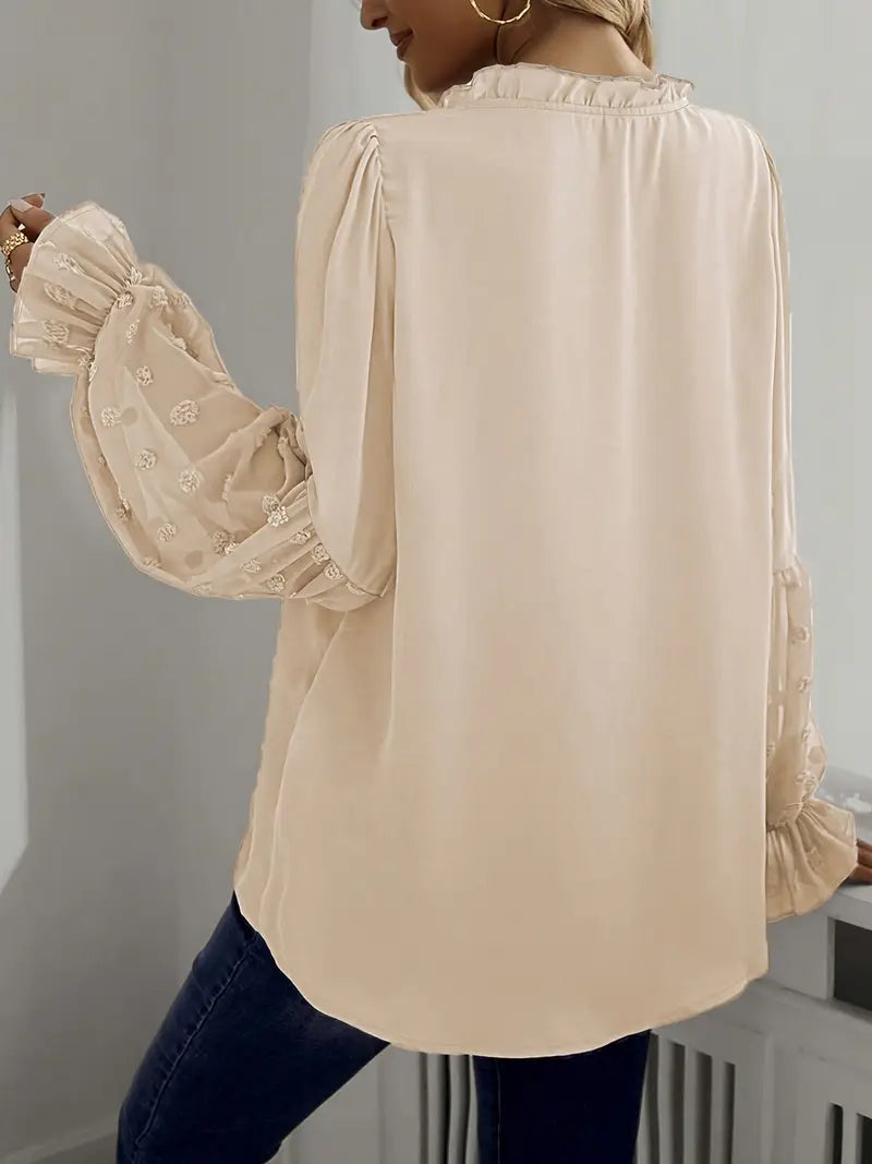 Nemirra – Stijlvolle, half doorschijnende blouse met franje